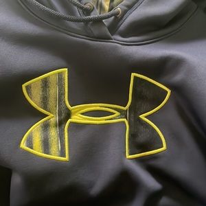 Women’s lg blue and yellow Under Armor hoodie. Very good condition.
